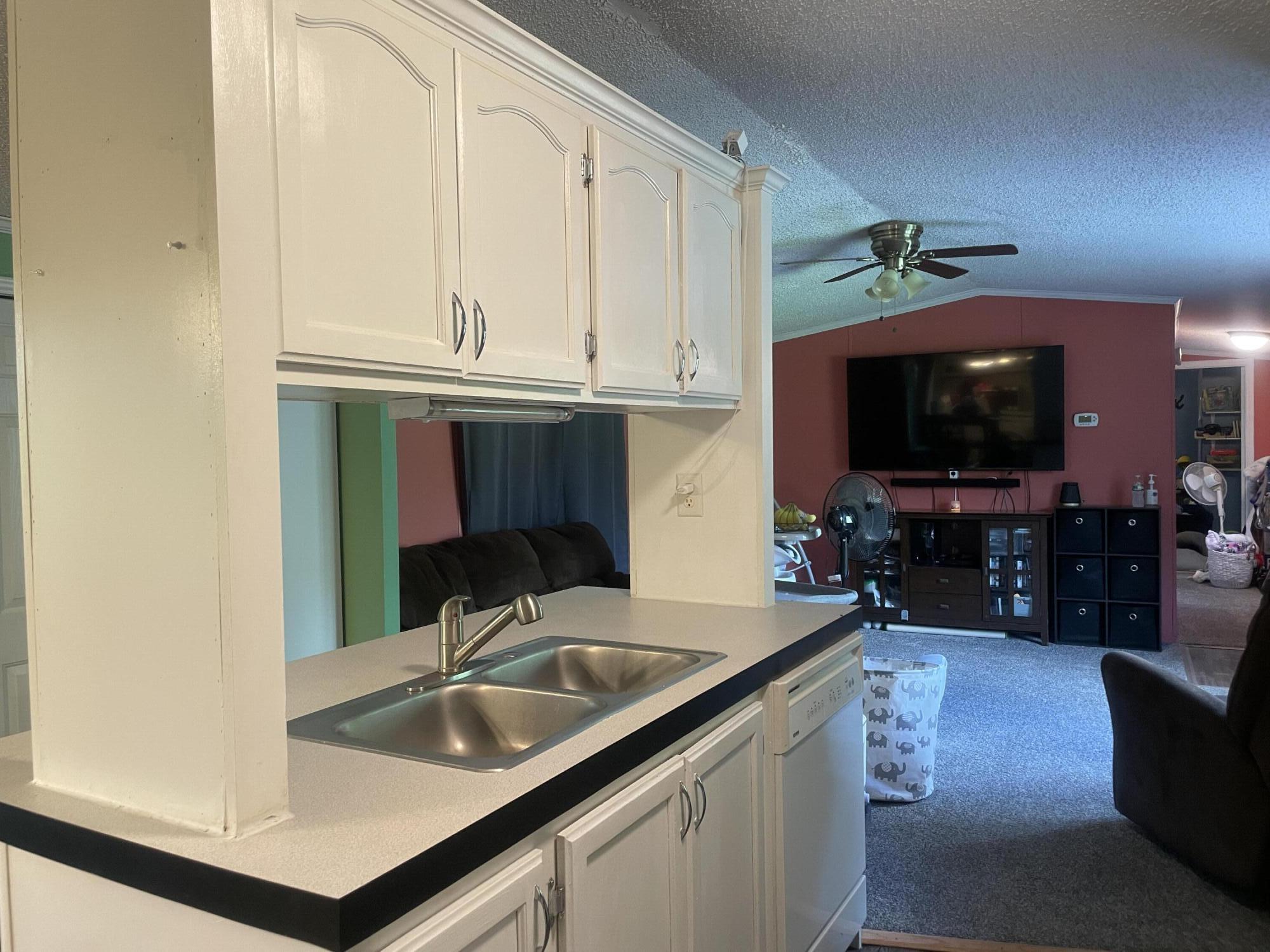 195 South Hunts Meadow Road Pittston, ME 04345 - Photo 19 of 37 kitchen island sink and dishwasher