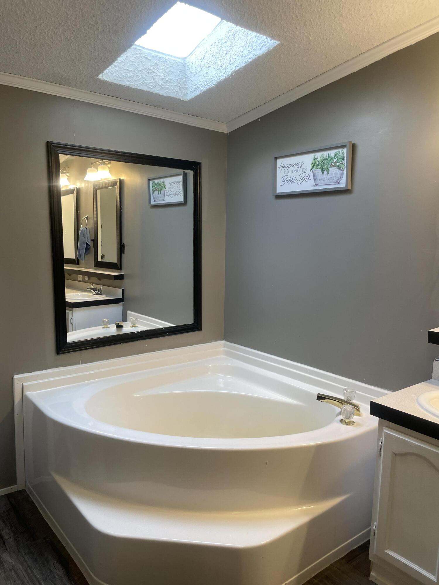 195 South Hunts Meadow Road Pittston, ME 04345 - Photo 27 of 37 tub with skylihght