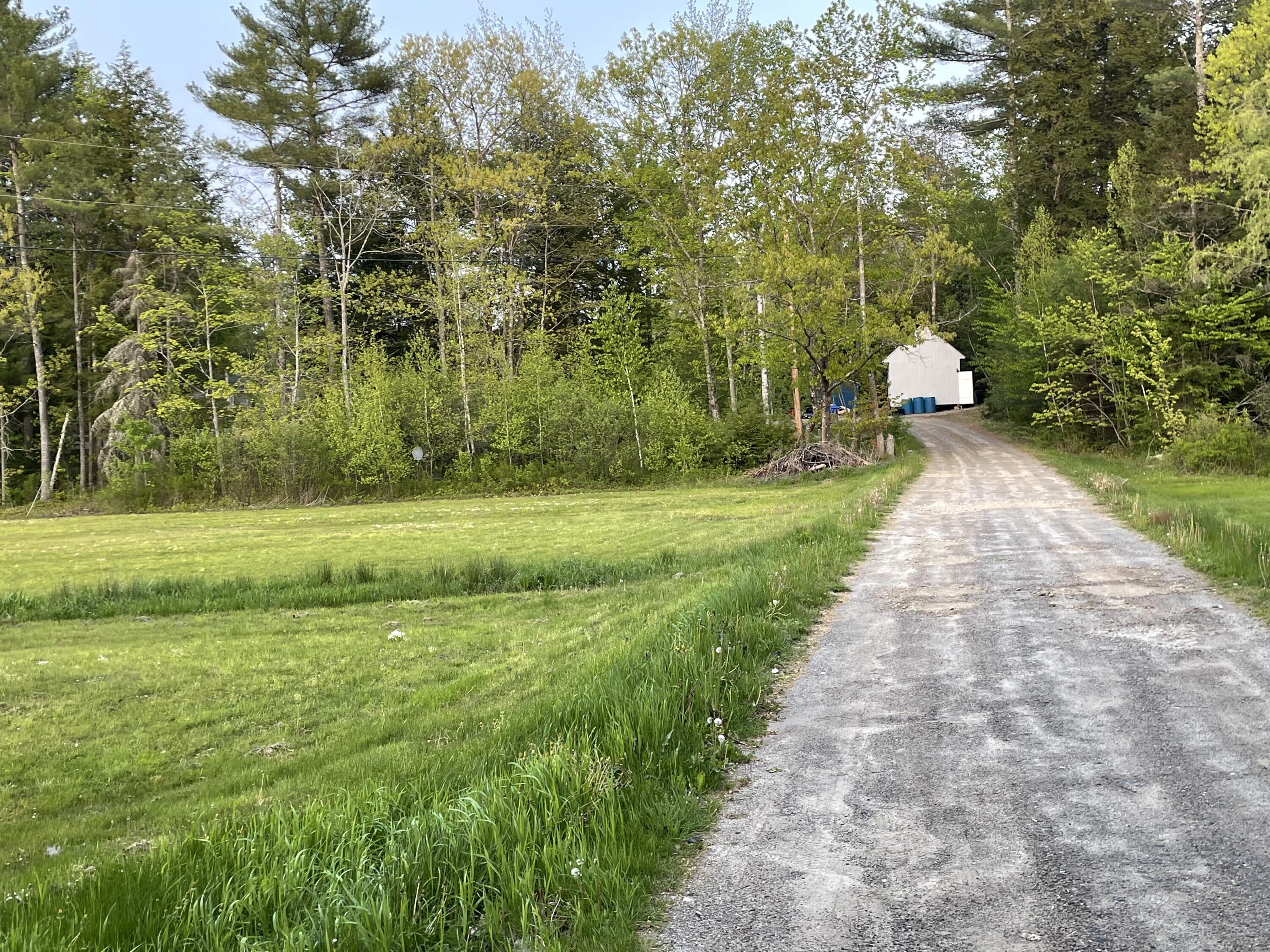 195 South Hunts Meadow Road Pittston, ME 04345 - Photo 31 of 37 long driveway adds privacy
