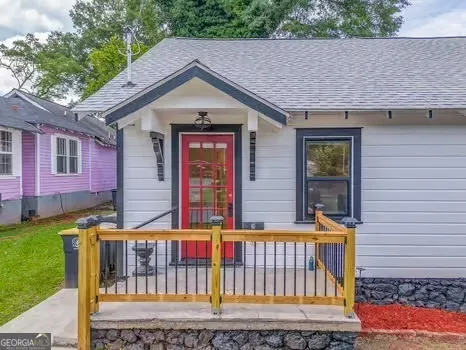 a front view of a house with yard