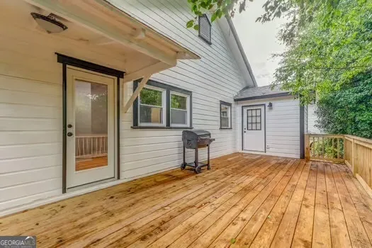 a balcony view with a seating space
