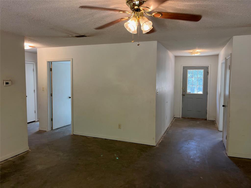 105 East Foggle Street Athens, TX 75751 - Photo 16 of 21 wooden floor in an empty room