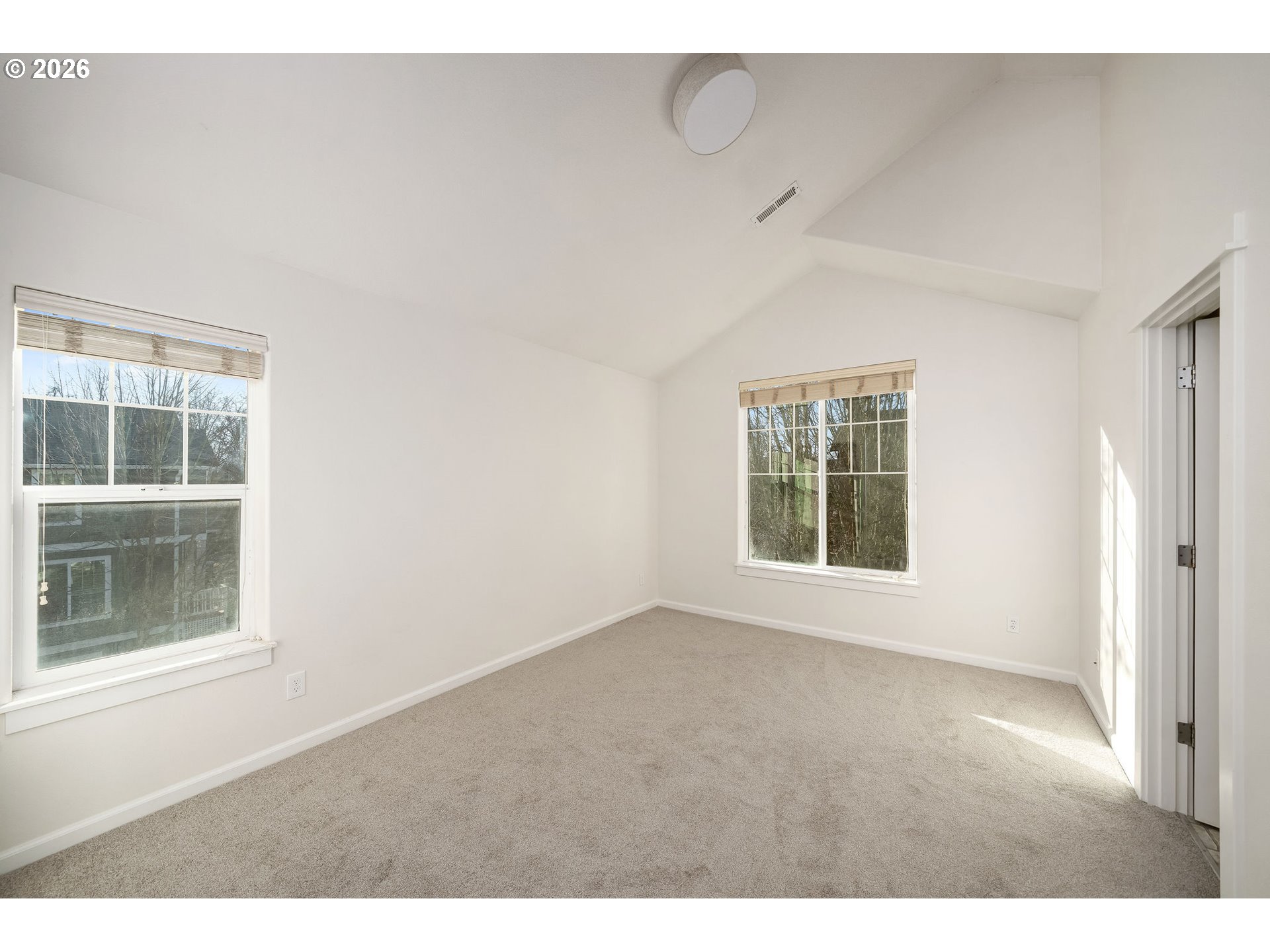 1190 Southwest 162nd Avenue Beaverton, OR 97006 - Photo 23 of 36 a view of an empty room with a window