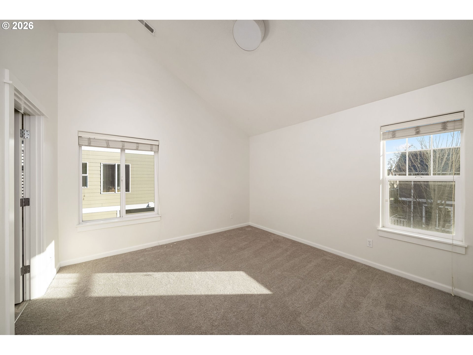 1190 Southwest 162nd Avenue Beaverton, OR 97006 - Photo 28 of 36 a view of an empty room with a window