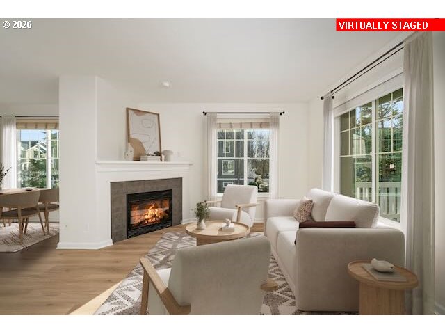 1190 Southwest 162nd Avenue Beaverton, OR 97006 - Photo 6 of 36 a living room with furniture and a fireplace