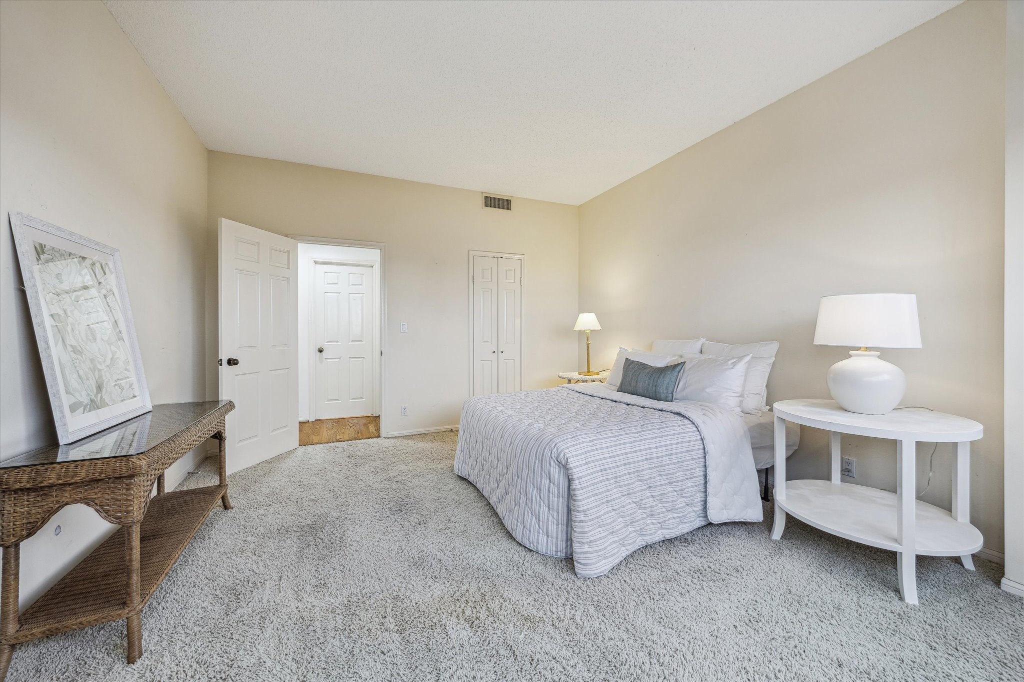 2001 Holcombe Boulevard, Unit 504 Houston, TX 77030 - Photo 13 of 38 a bedroom with a bed and a flat screen tv