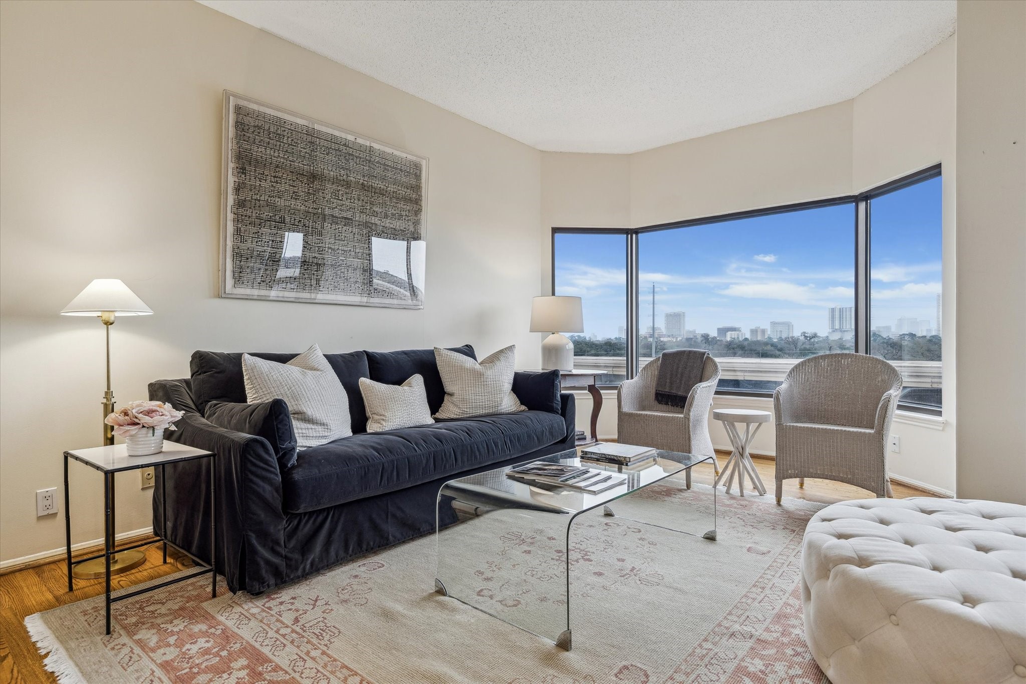 2001 Holcombe Boulevard, Unit 504 Houston, TX 77030 - Photo 3 of 38 a living room with furniture a lamp and a large window