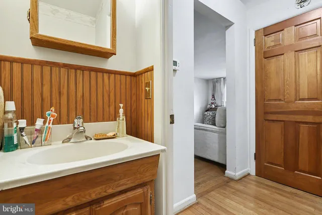 a kitchen with a sink cabinets and appliances