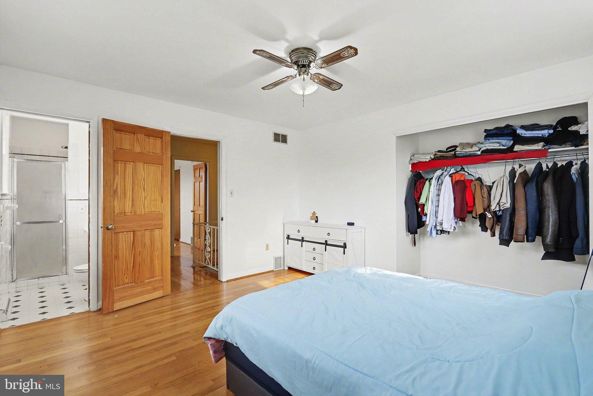 2072 Andover Drive Dover, PA 17315 - Photo 19 of 30 a bed room with a bed and a walk in closet