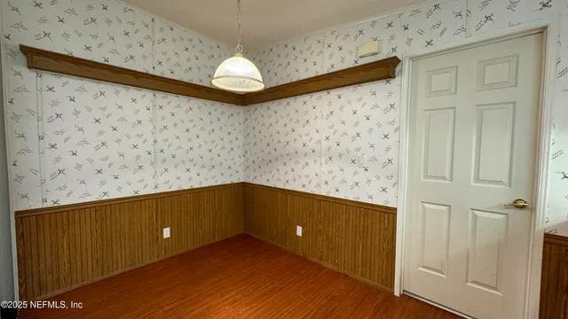 a utility room with sink dryer and washer