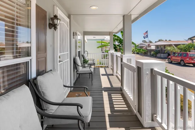 a dining room with furniture window and outdoor view