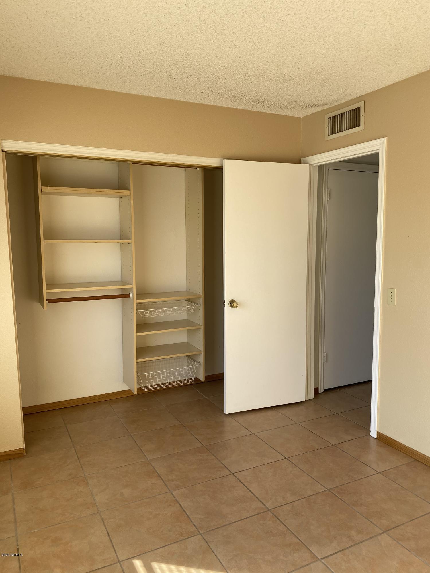 6932 West Paradise Drive Peoria, AZ 85345 - Photo 10 of 15 a view of an empty room