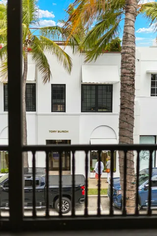 a view of an empty room with a fan