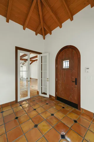 a view of an empty room and window
