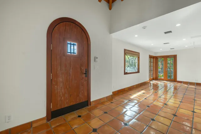 a view of a room with windows