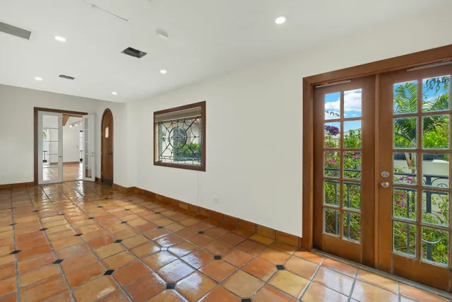 a bathroom with a sink toilet and a mirror