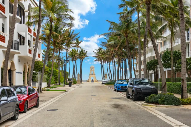 an aerial view of a houses with a swimming pool
