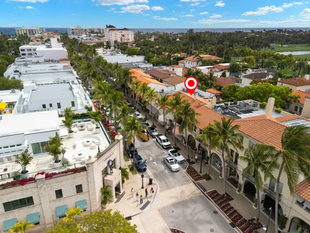 an aerial view of residential building and ocean