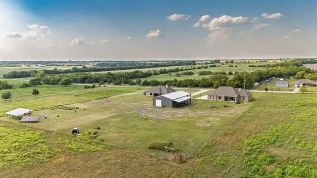 a view of a lake with a big yard
