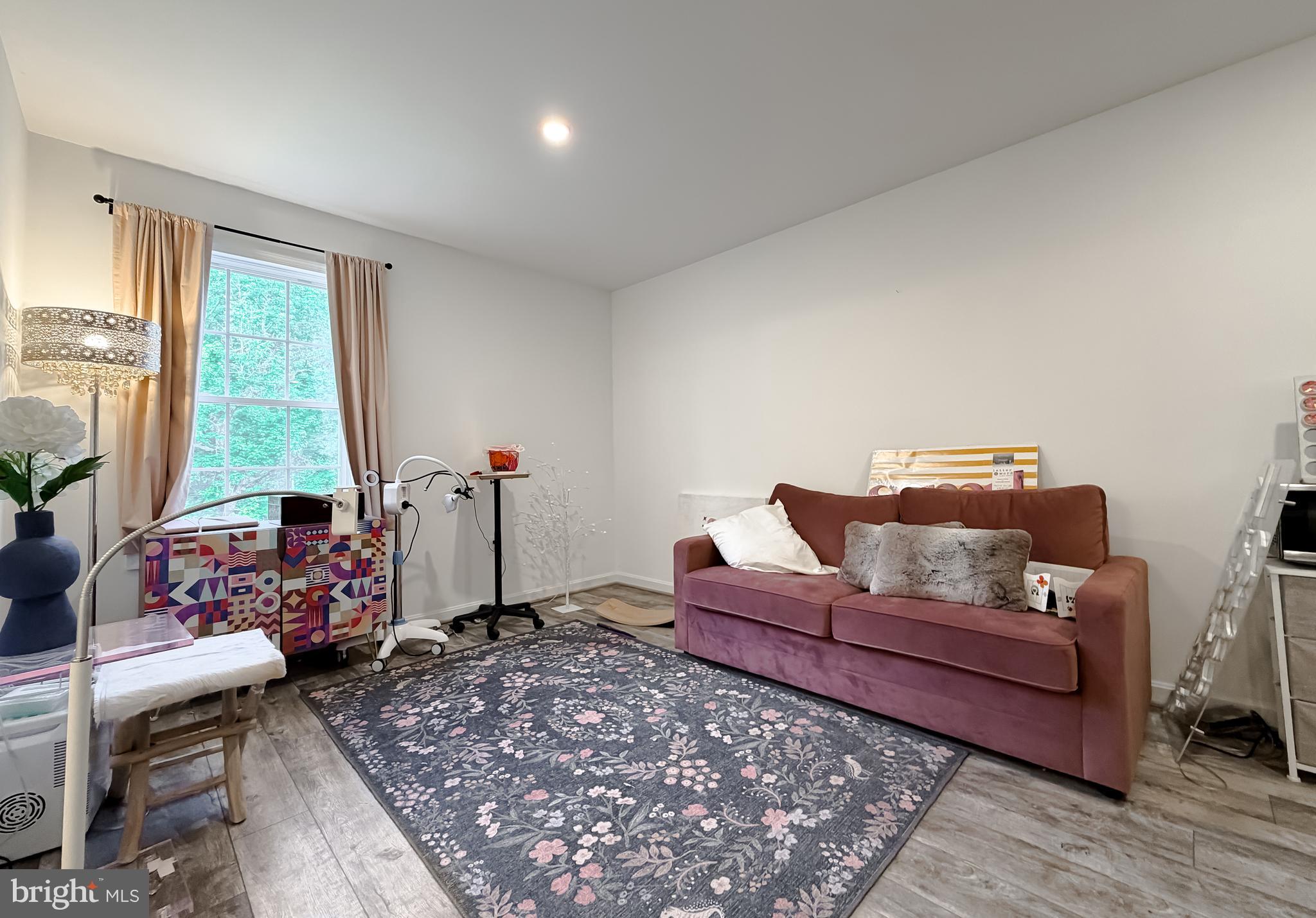 16146 Thomas Road Piney Point, MD 20674 - Photo 34 of 57 a living room with furniture and a window