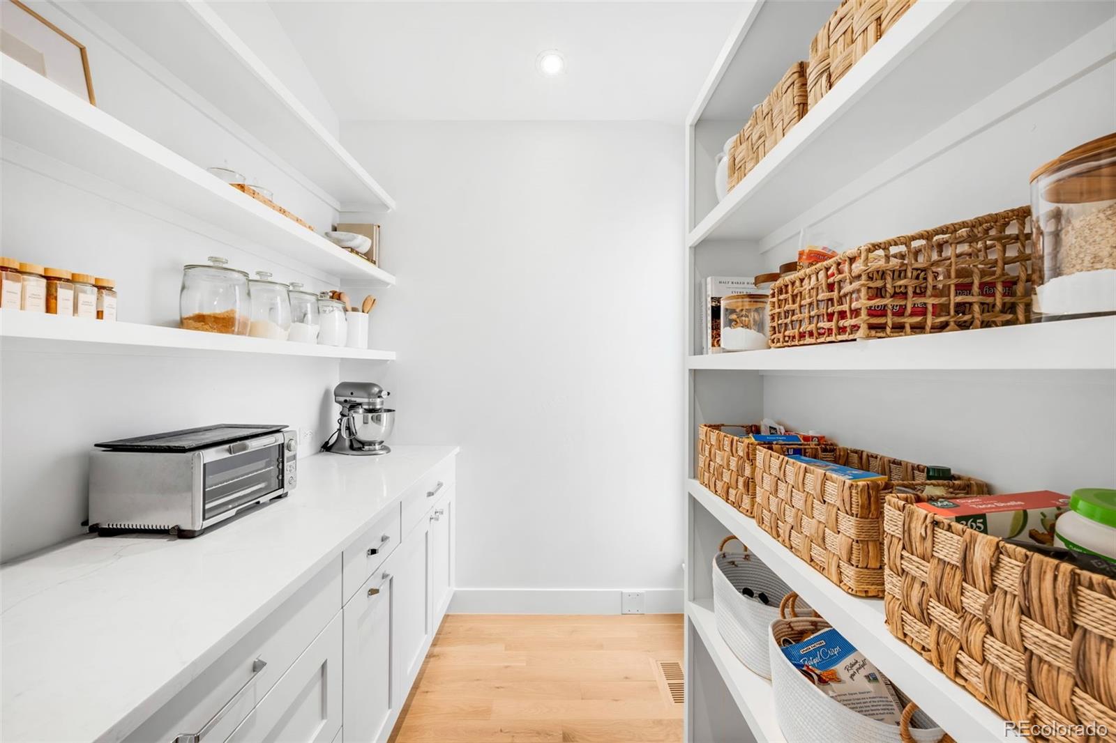 2900 South Madison Street Denver, CO 80210 - Photo 34 of 46 a kitchen with stainless steel appliances a cabinets and window