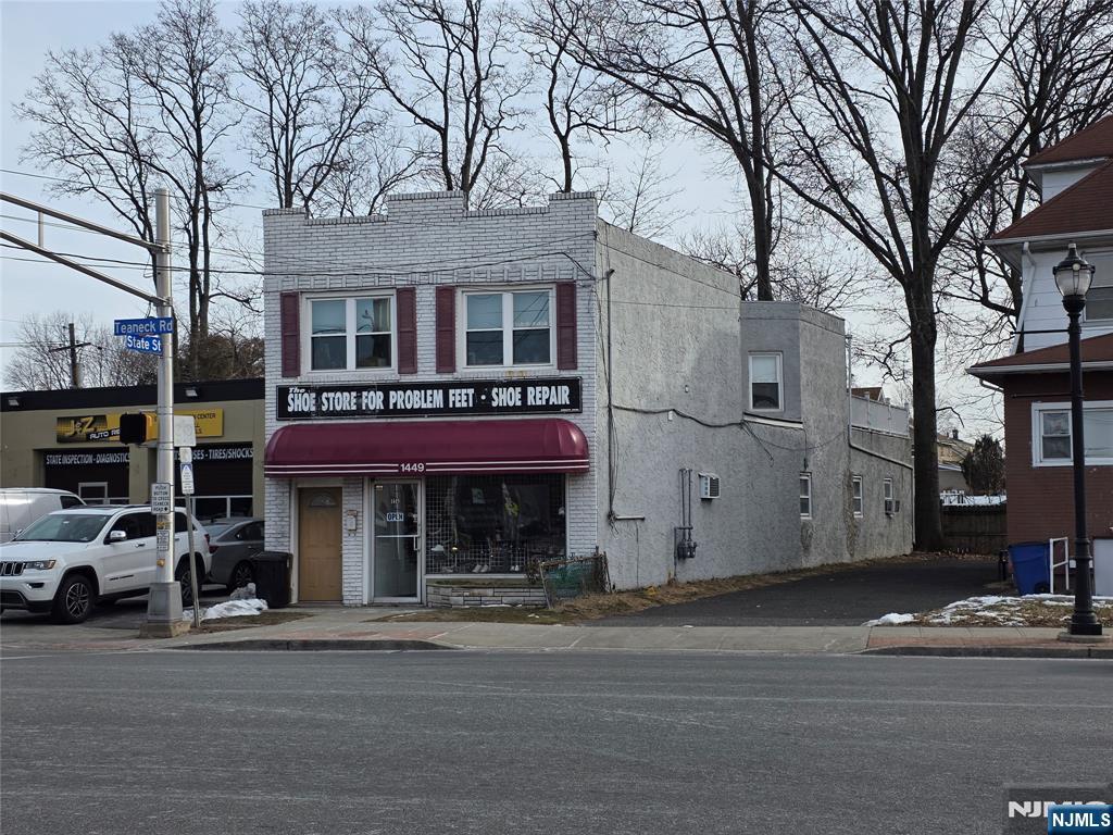 a front view of a building with street