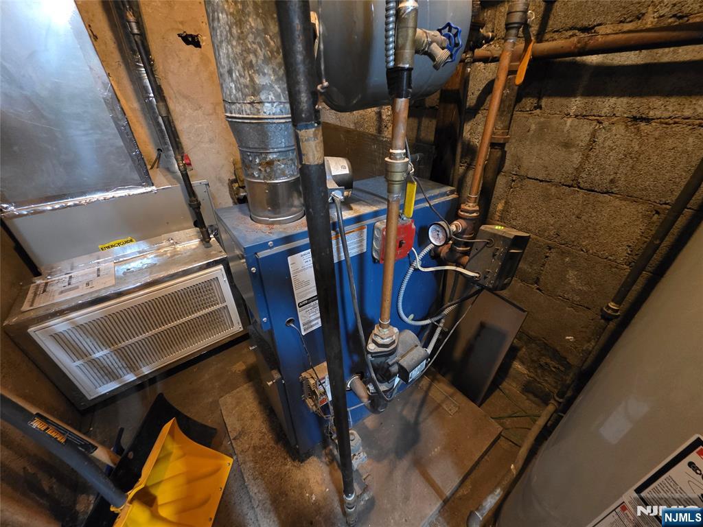 1449 Teaneck Road Teaneck, NJ 07666 - Photo 11 of 26 a view of a room with gym equipment