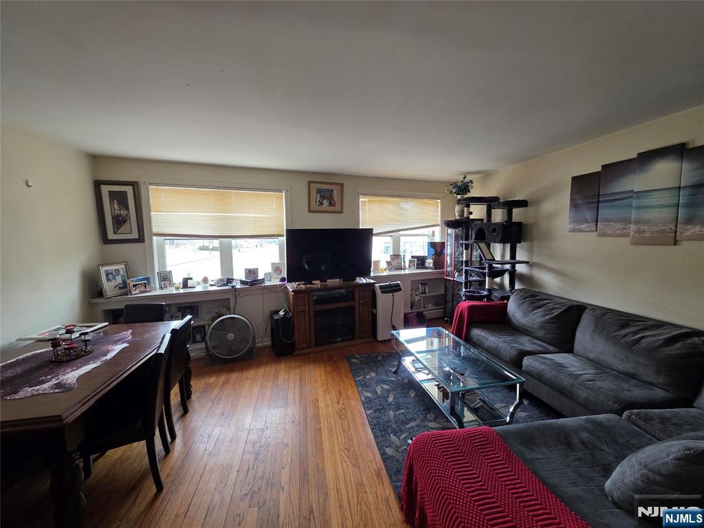 1449 Teaneck Road Teaneck, NJ 07666 - Photo 16 of 26 a living room with furniture kitchen view and a window