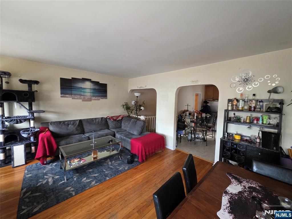 1449 Teaneck Road Teaneck, NJ 07666 - Photo 17 of 26 a living room with furniture and a flat screen tv