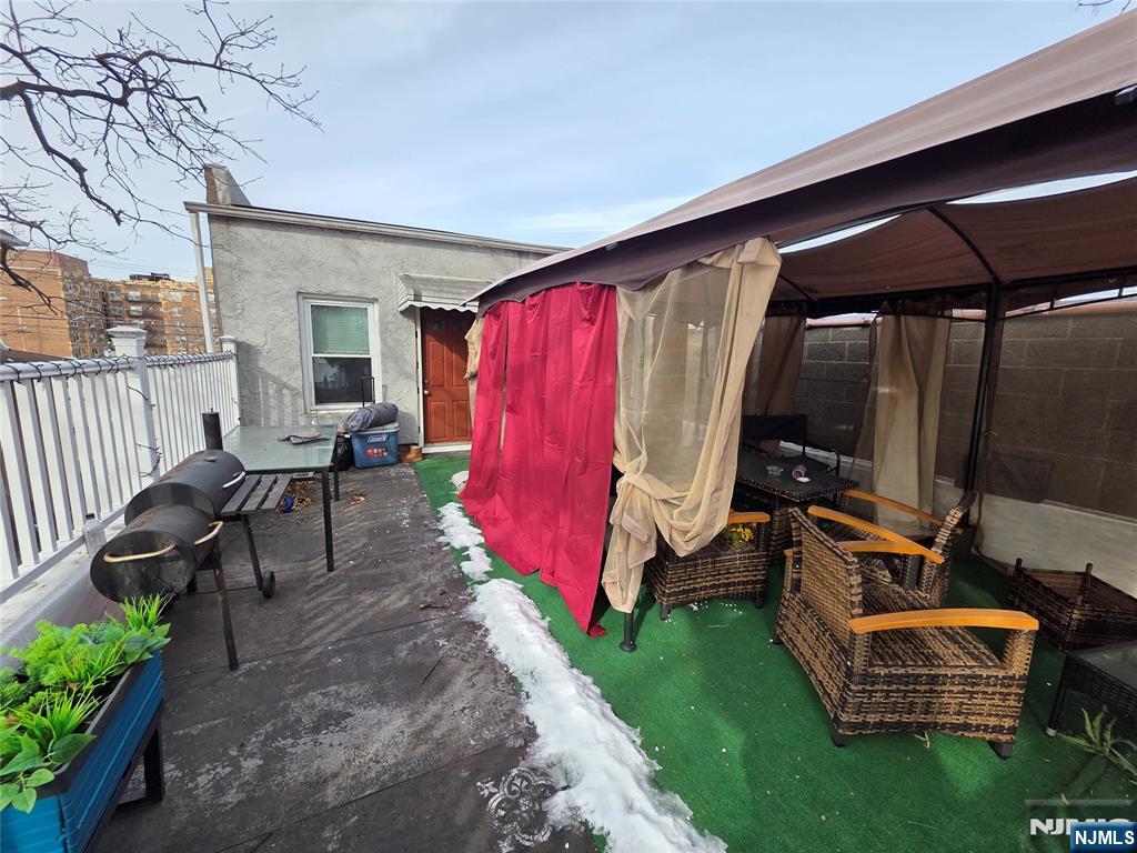 1449 Teaneck Road Teaneck, NJ 07666 - Photo 24 of 26 a view of a backyard with sitting area