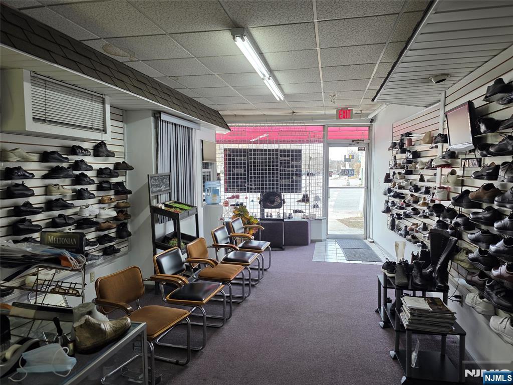 1449 Teaneck Road Teaneck, NJ 07666 - Photo 8 of 26 a room with gym equipment and lots of windows