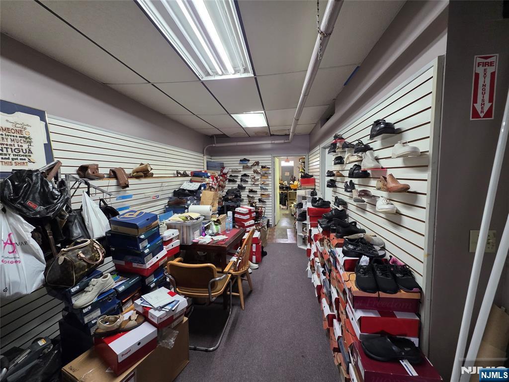 1449 Teaneck Road Teaneck, NJ 07666 - Photo 9 of 26 a view of a storage room with racks on the wall