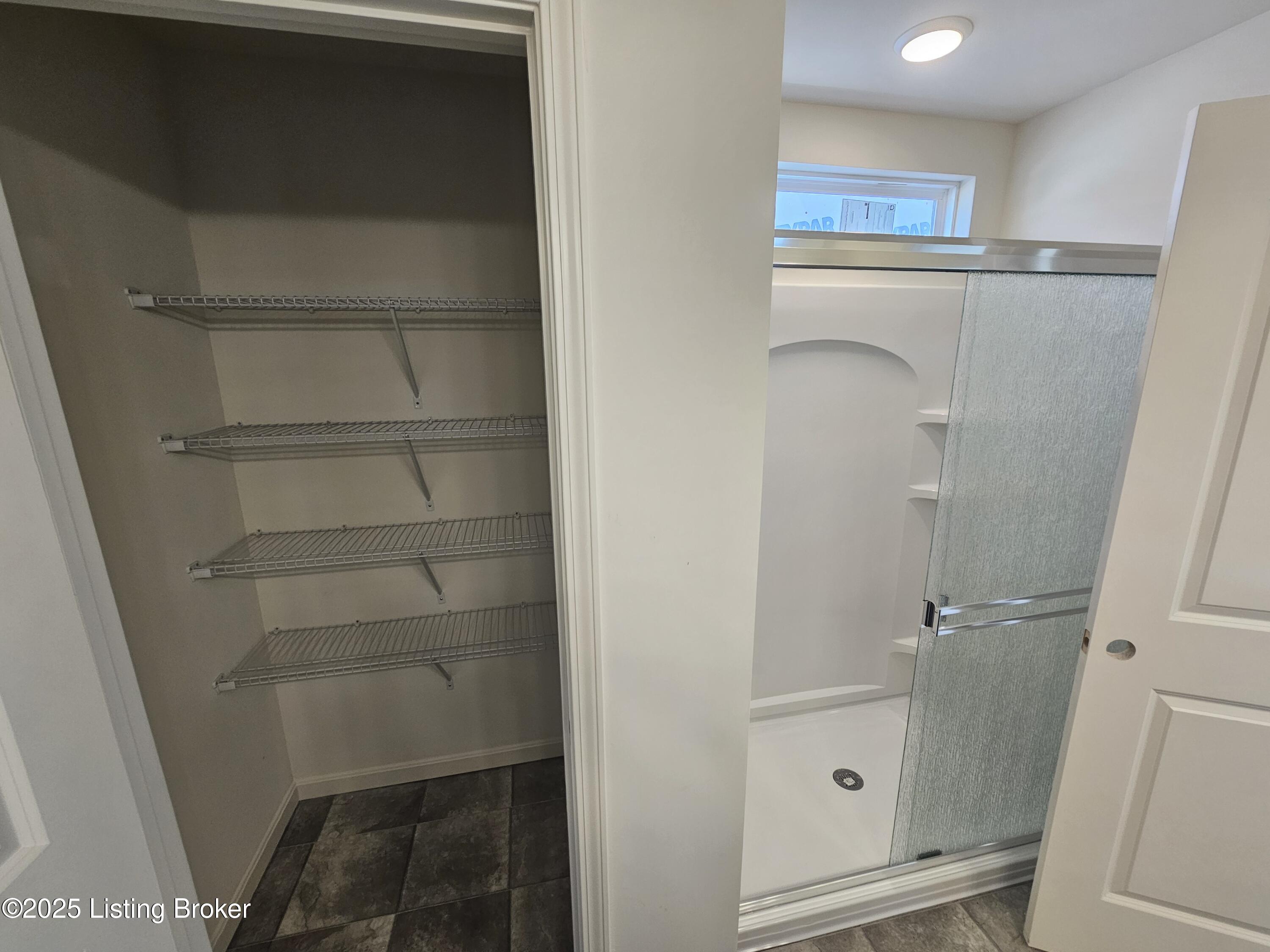 6504 Fair Rdg Lane Louisville, KY 40291 - Photo 19 of 27 primary bath linen and shower