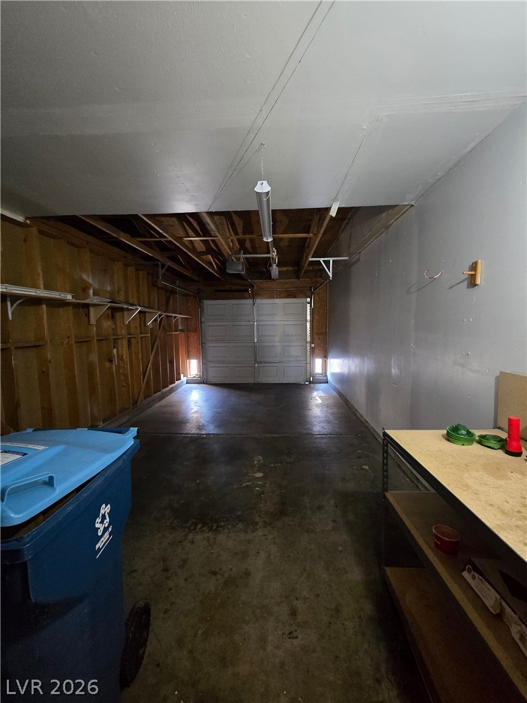6750 Del Rey Avenue, Unit 133 Las Vegas, NV 89146 - Photo 30 of 34 Secure parking and ample storage solutions await in this practical garage space.
