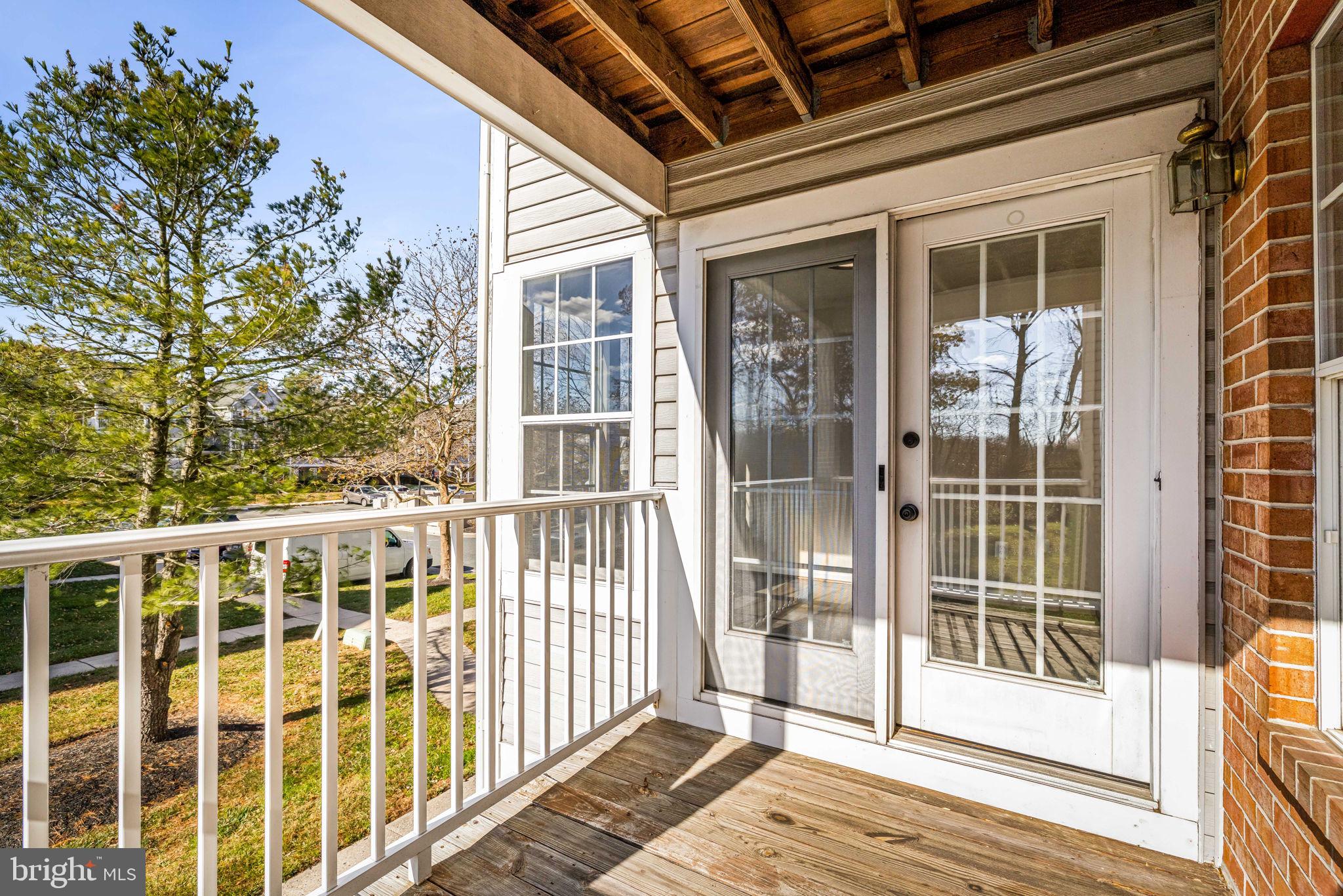 41 Laurel Path Court, Unit 5 Baltimore, MD 21236 - Photo 18 of 32 a view of a glass door with a large window