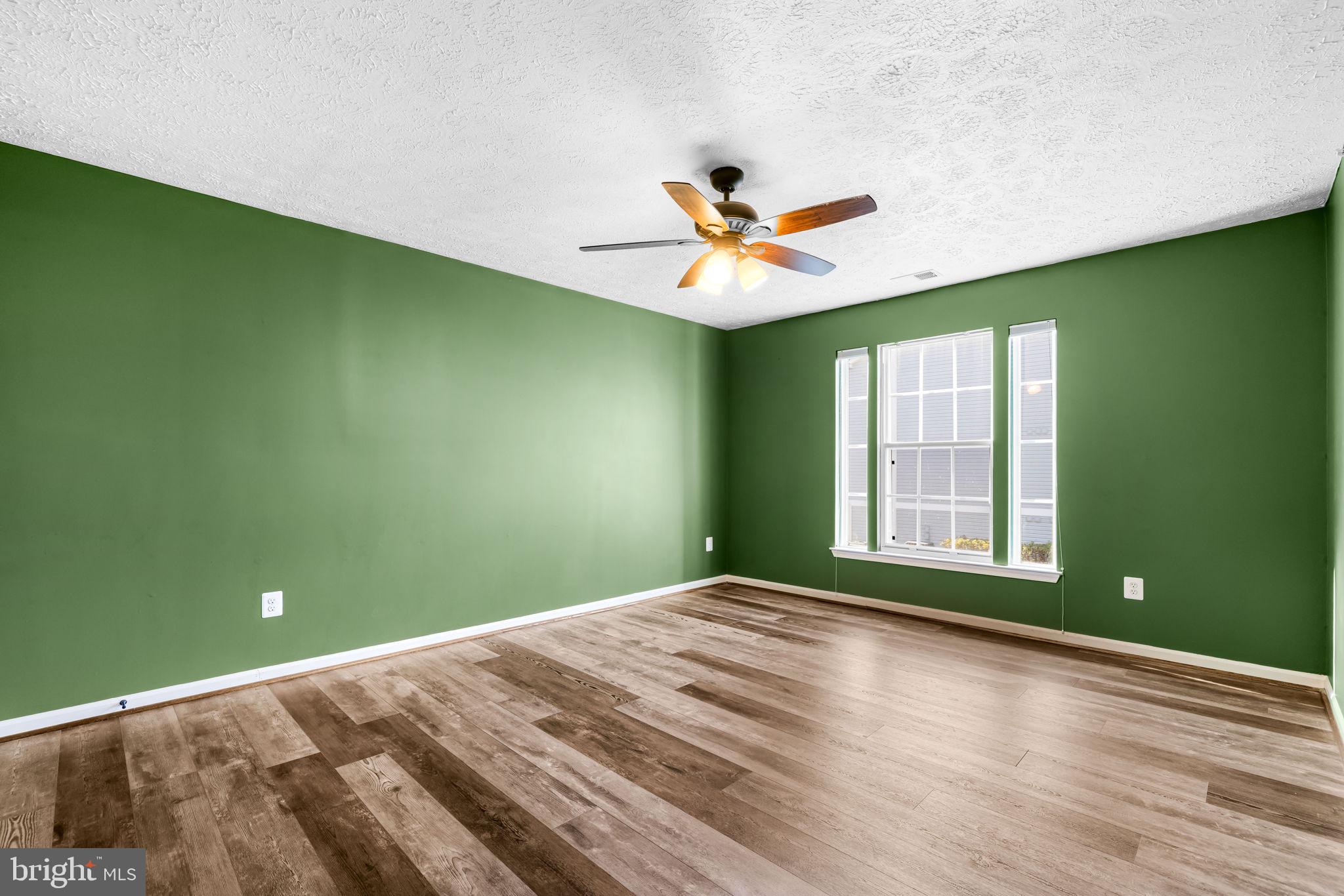 41 Laurel Path Court, Unit 5 Baltimore, MD 21236 - Photo 25 of 32 a view of empty room with window and ceiling fan