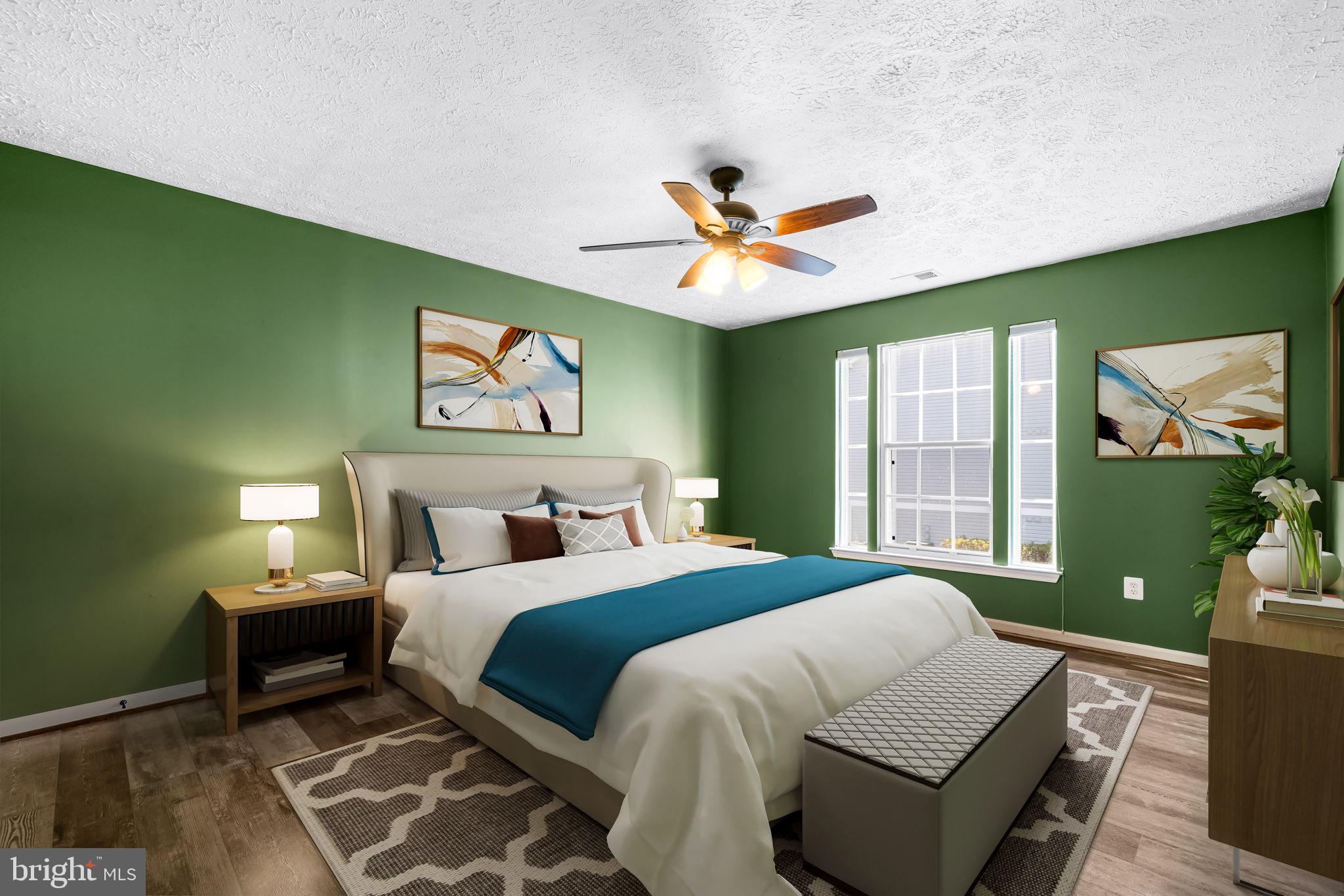 41 Laurel Path Court, Unit 5 Baltimore, MD 21236 - Photo 26 of 32 a bedroom with a large bed and a window