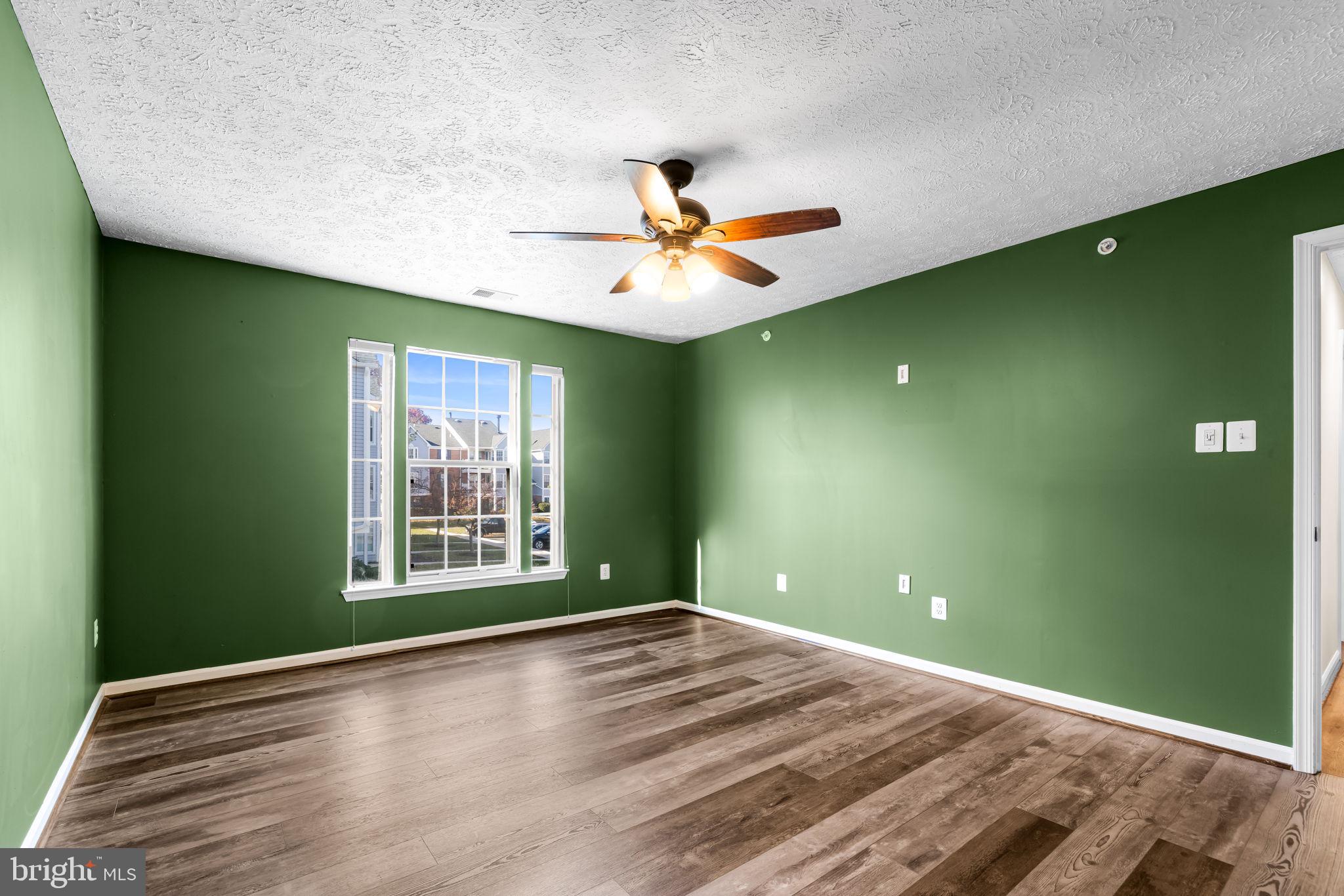 41 Laurel Path Court, Unit 5 Baltimore, MD 21236 - Photo 27 of 32 a view of room with window and ceiling fan