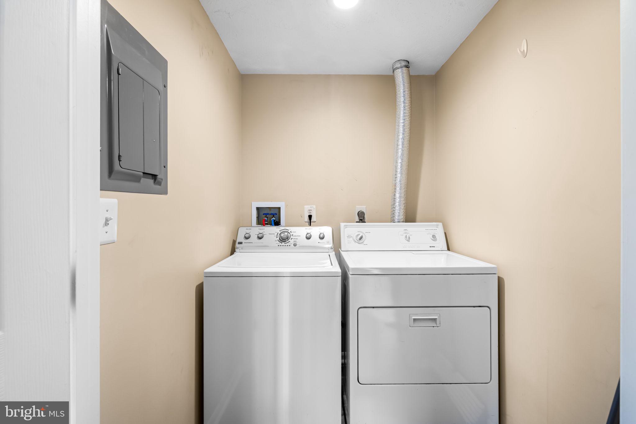 41 Laurel Path Court, Unit 5 Baltimore, MD 21236 - Photo 31 of 32 a utility room with dryer and washer