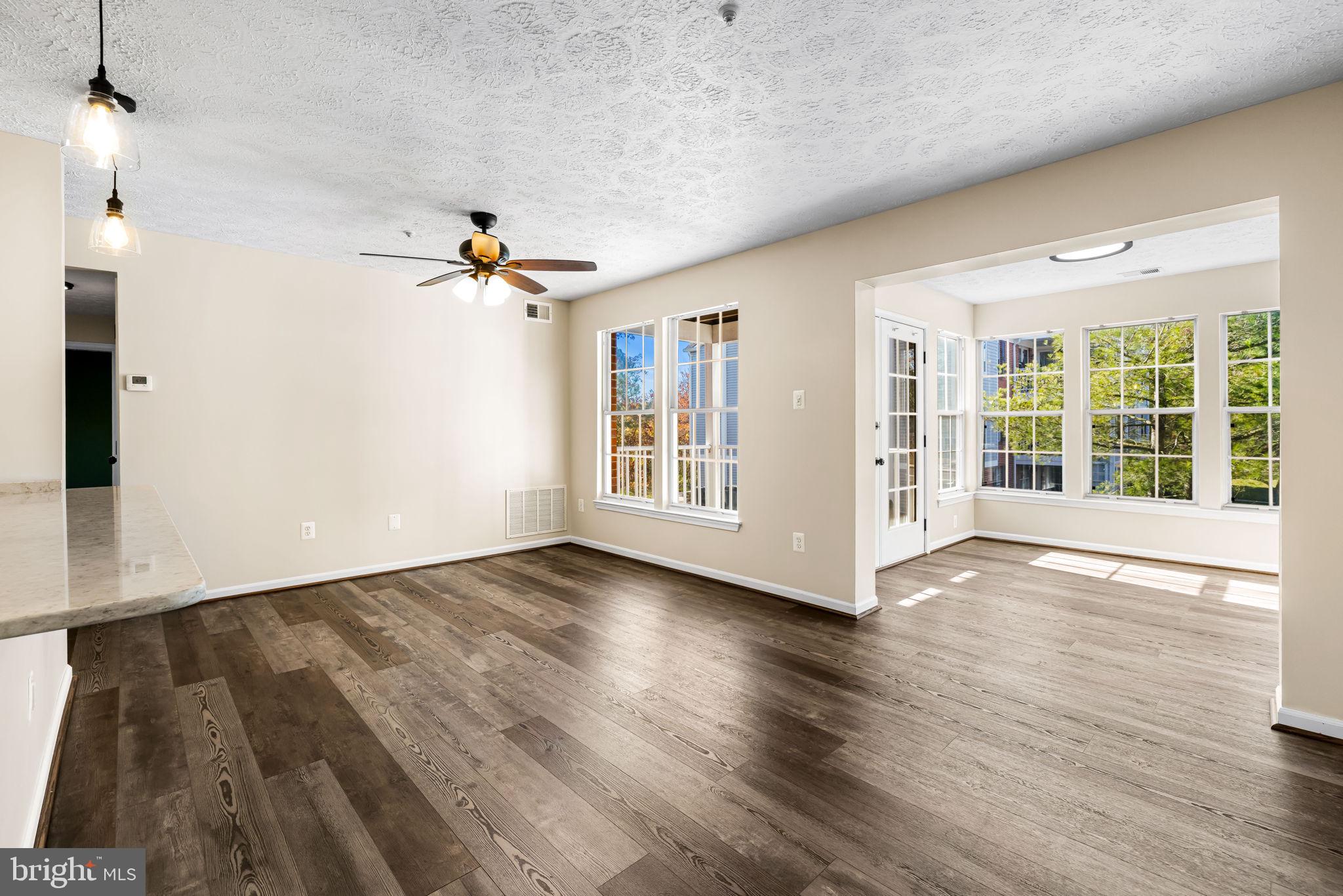 41 Laurel Path Court, Unit 5 Baltimore, MD 21236 - Photo 6 of 32 a view of an entryway with wooden floor