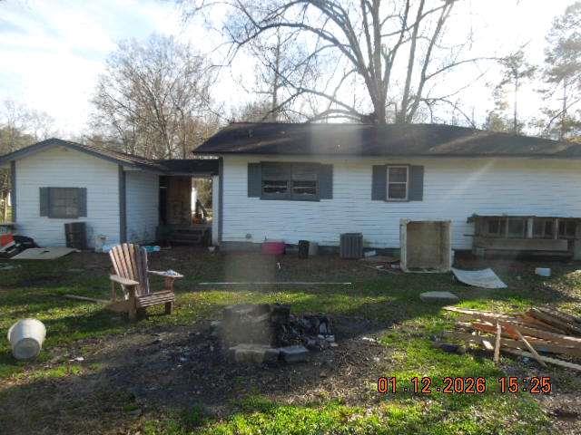 152 Hennon Drive Northwest Rome, GA 30165 - Photo 4 of 4 a front view of a house with garden