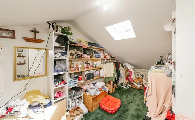a living room with furniture fireplace and flat screen tv