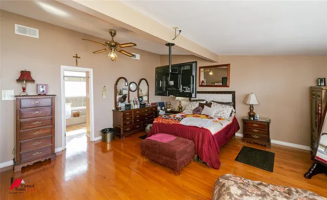 a bathroom with bathtub and shower
