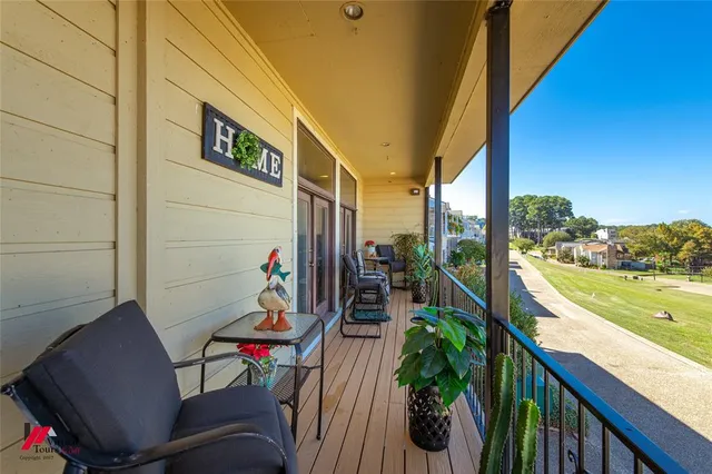 a view of a swimming pool with a chairs