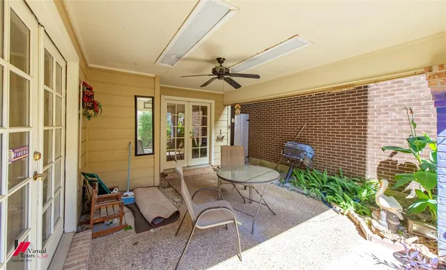 a view of a dining room with furniture and a livingroom