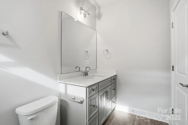 a bathroom with a shower and a sink