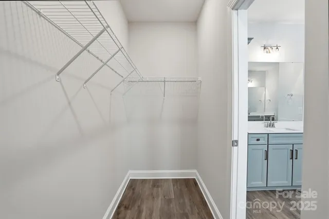 a bathroom with a sink and shower