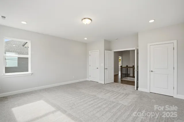 a view of a room that has a window in it