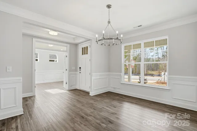 a view of livingroom with hardwood floor and window