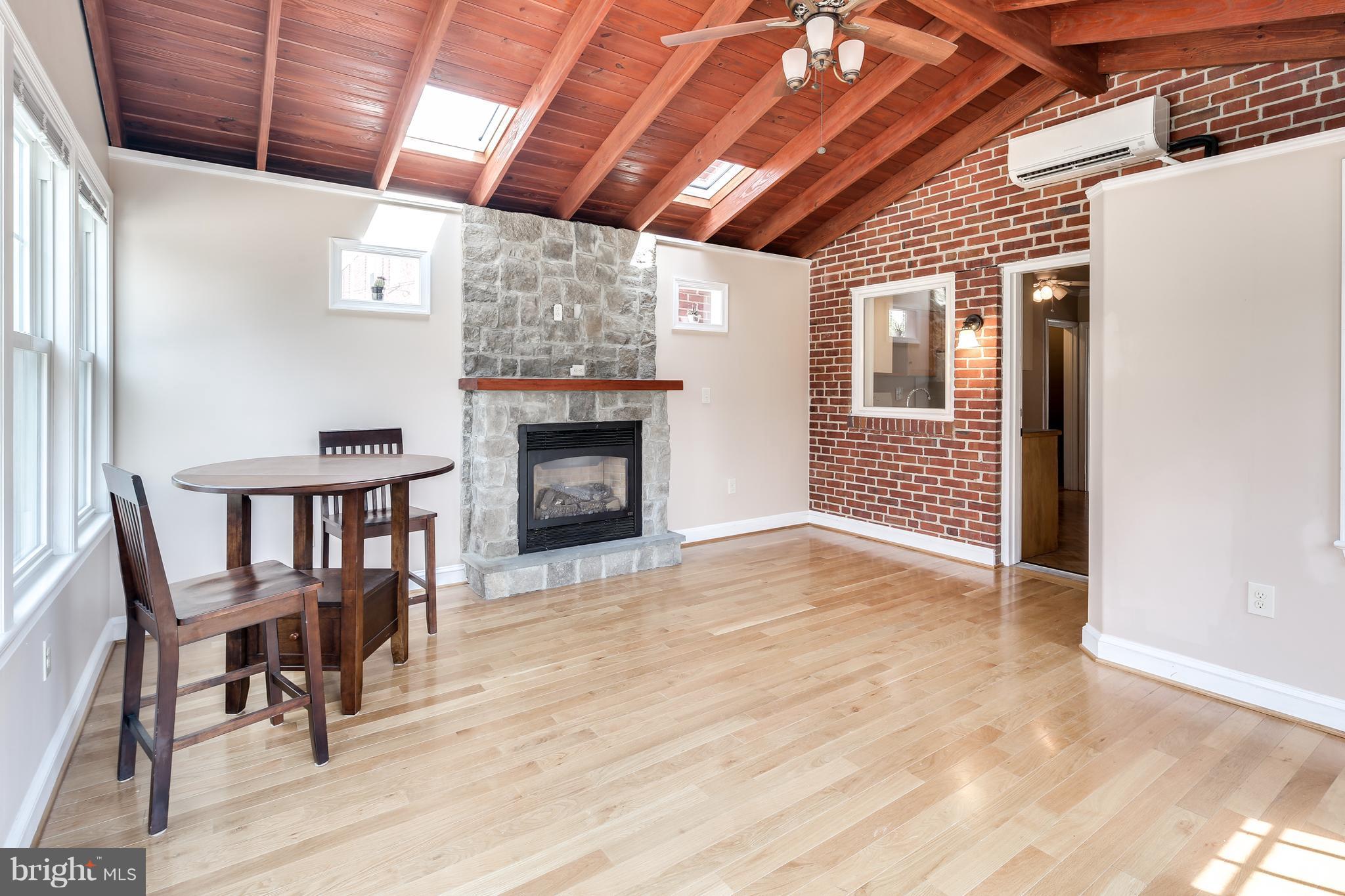 1611 Feldbrook Road Towson, MD 21286 - Photo 15 of 27 Family Room w/ FP & Beautiful Wood Ceiling